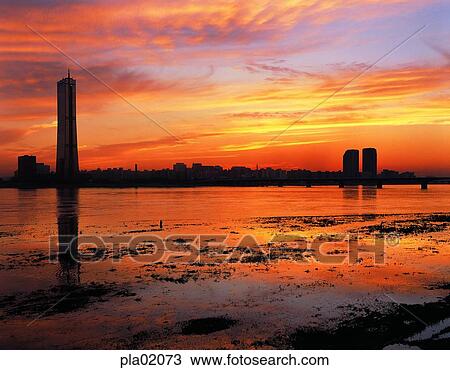 building, construction, red sky, sunset, sunrise, reflection View Large Photo Image Stock Image - building, construction, red sky, sunset, sunrise, reflection. Fotosearch