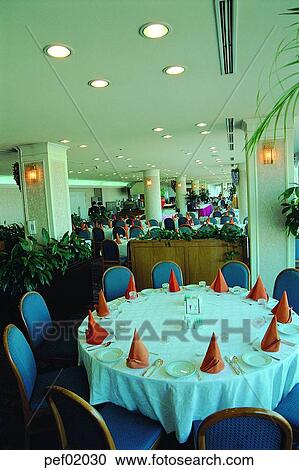 Stock Image - building, construction, men, male, Oriental, restaurant. Fotosearch