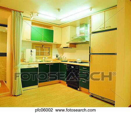Stock Image - furniture, gas oven range, gas stove, refrigerator, kitchen, indoor. Fotosearch