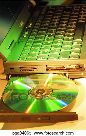Stock Photography - notebook, drive, articles, things, objects, CD. Fotosearch
