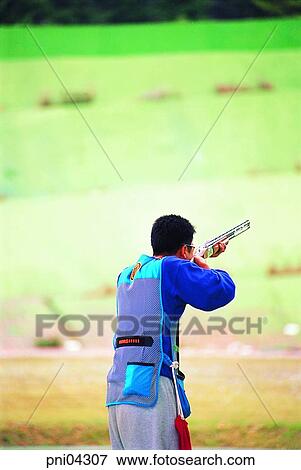 Stock Photo - day, Oriental, shooting, gunshot, person, people. Fotosearch