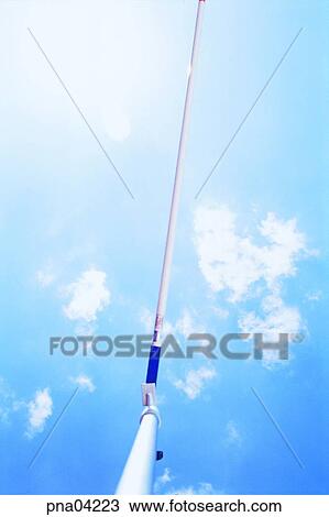 Stock Image - day, sports, outdoor, exterior, athletic sports, pole vault. Fotosearch