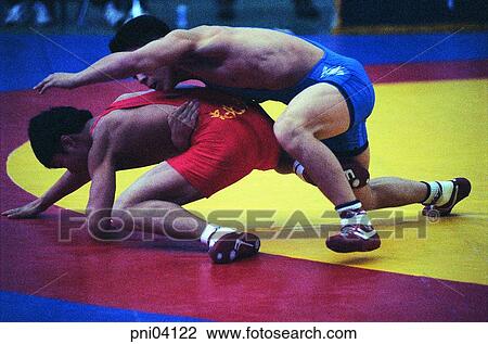 Stock Image - men, male, Oriental, two people, wrestling, person. Fotosearch