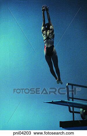 Stock Image - diving, behind, back, person, people, men. Fotosearch