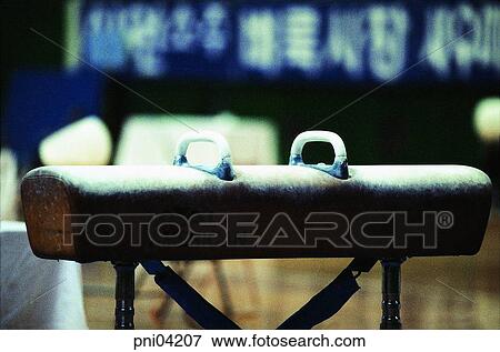 Stock Photo - sports, indoor, side horse, gymnastics, gym. Fotosearch