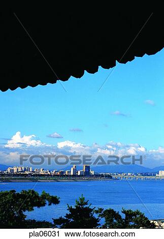Stock Image - river, building, structure, building, construction, terrace land on the river, cloud. Fotosearch
