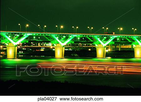 Stock Photo - street lamp, street light, bridge, terrace land on the river, pier, bridge, bridge. Fotosearch