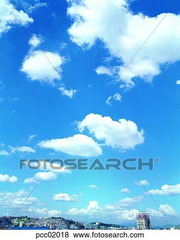 cloud, clouds, clouds, day, city, sky of a city, whole view of a city View Large Photo Image Stock Photo - cloud, clouds, clouds, day, city, sky of a city, whole view of a city. Fotosearch