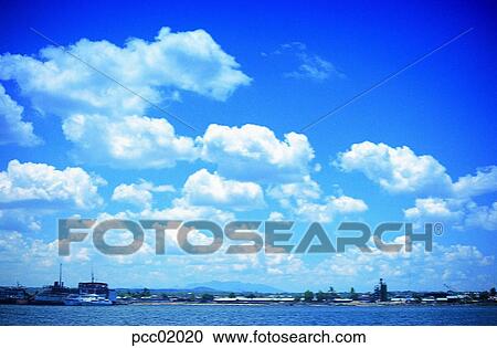 Stock Image - cloud, clouds, clouds, day, towering mass of clouds, sea, beach. Fotosearch