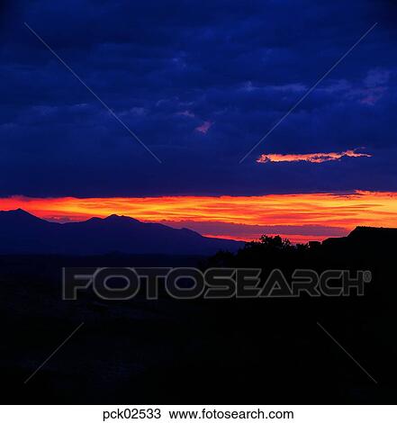 cloud, red sky, sunset, sunrise, ridgeline, outline View Large Photo Image Stock Image - cloud, red sky, sunset, sunrise, ridgeline, outline. Fotosearch