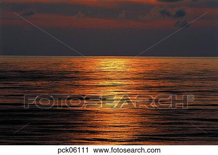cloud, red sky, sunset, sunrise, wave, surge, ripple View Large Photo Image Stock Image - cloud, red sky, sunset, sunrise, wave, surge, ripple. Fotosearch