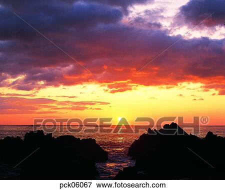 Stock Photo - light, ray, beam, red sky, sunset, sunrise, wave. Fotosearch