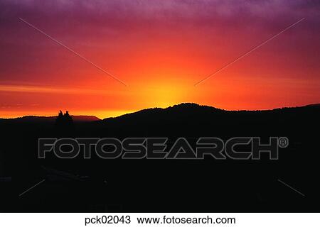 red sky, sunset, sunrise, ridgeline, outline, mountain View Large Photo Image Stock Image - red sky, sunset, sunrise, ridgeline, outline, mountain. Fotosearch