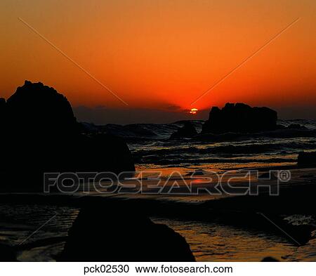 red sky, sunset, sunrise, stone, rock, sandy beach, sands View Large Photo Image Stock Image - red sky, sunset, sunrise, stone, rock, sandy beach, sands. Fotosearch