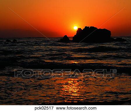 red sky, sunset, sunrise, wave, surge, ripple, shadows on the water View Large Photo Image Stock Photo - red sky, sunset, sunrise, wave, surge, ripple, shadows on the water. Fotosearch