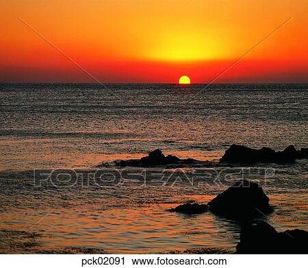 Stock Image - rock, red sky, stone, sunrise, sunset, sea, 0790. Fotosearch