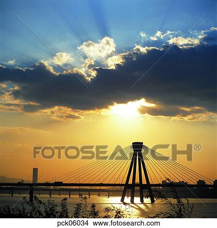 bridge, light, ray, beam, pier, bridge, cloud View Large Photo Image Picture - bridge, light, ray, beam, pier, bridge, cloud. Fotosearch