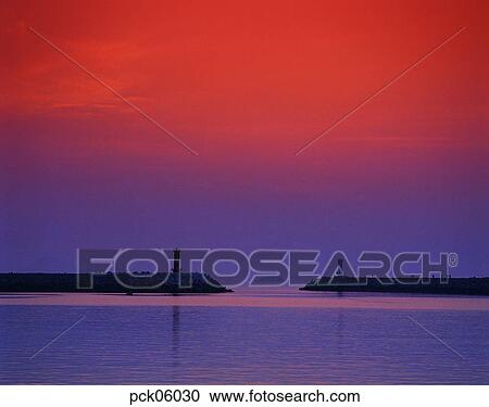 cloud, red sky, sunset, sunrise, lighthouse, beacon, wave View Large Photo Image Stock Image - cloud, red sky, sunset, sunrise, lighthouse, beacon, wave. Fotosearch