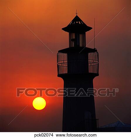 red sky, sunset, sunrise, lighthouse, beacon, sea scene, sea view View Large Photo Image Picture - red sky, sunset, sunrise, lighthouse, beacon, sea scene, sea view. Fotosearch