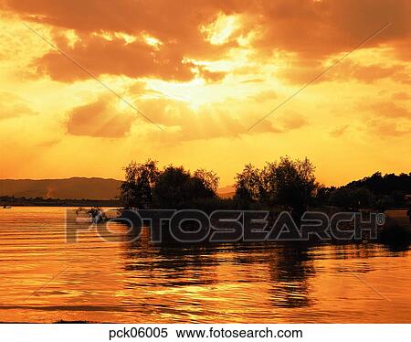 river, riverside, light, ray, beam, cloud, tree View Large Photo Image Stock Photography - river, riverside, light, ray, beam, cloud, tree. Fotosearch