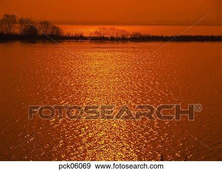 river, riverside, red sky, sunset, sunrise, waterside, shore View Large Photo Image Stock Photo - river, riverside, red sky, sunset, sunrise, waterside, shore. Fotosearch