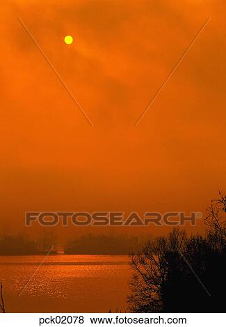 river, riverside, riverside village, tree, red sky, sunset, sunrise View Large Photo Image Stock Photo - river, riverside, riverside village, tree, red sky, sunset, sunrise. Fotosearch