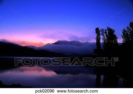 river, riverside, riverside village, calm, cloud, tree, red sky View Large Photo Image Stock Photograph - river, riverside, riverside village, calm, cloud, tree, red sky. Fotosearch