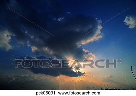 street light, street lamp, cloud, red sky, sunset, sunrise, towering mass of clouds View Large Photo Image Stock Image - street light, street lamp, cloud, red sky, sunset, sunrise, towering mass of clouds. Fotosearch