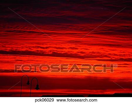 street light, street lamp, cloud, red sky, sunset, sunrise View Large Photo Image Stock Photo - street light, street lamp, cloud, red sky, sunset, sunrise. Fotosearch