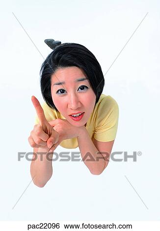 Stock Photograph - forefinger, Oriental, model, person, people, men. Fotosearch