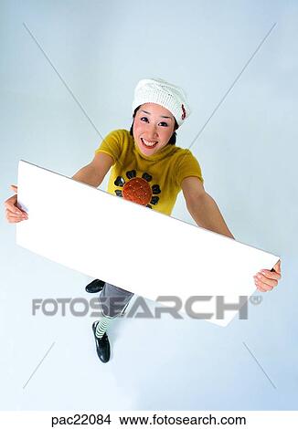 Picture - hat, ad sign, model, memo board, Oriental, advertisement. Fotosearch