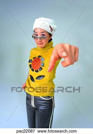 Stock Photo - Oriental, model, hat, cap, wearing a hat, person, people. Fotosearch