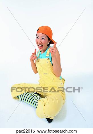 Oriental, overalls, model, wearing a hat, smile, person, people View Large Photo Image Stock Photography - Oriental, overalls, model, wearing a hat, smile, person, people. Fotosearch