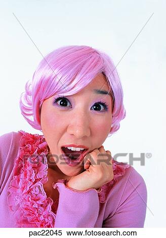 Stock Photography - surprising look, shocked look, surprise, amazement, Oriental, model, person. Fotosearch