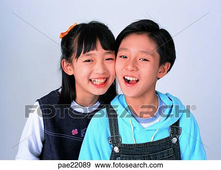 Stock Photo - man and woman, men and women, male and female, brother and sister, man and woman, men and women, male and female. Fotosearch