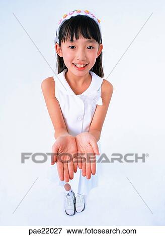 Nuki, Oriental, hands, smile, person, people View Large Photo Image Stock Photo - Nuki, Oriental, hands, smile, person, people. Fotosearch