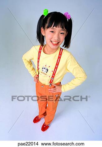 Nuki, Oriental, overalls, smile, person, people View Large Photo Image Picture - Nuki, Oriental, overalls, smile, person, people. Fotosearch