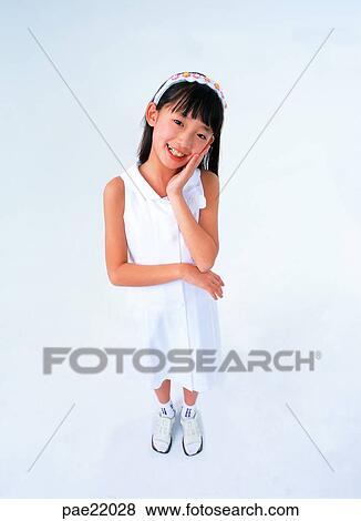 Nuki, Oriental, smile, shy, shame, person, people View Large Photo Image Stock Photo - Nuki, Oriental, smile, shy, shame, person, people. Fotosearch