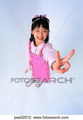 Nuki, Oriental, smile, victory, victory, person, people View Large Photo Image Stock Image - Nuki, Oriental, smile, victory, victory, person, people. Fotosearch