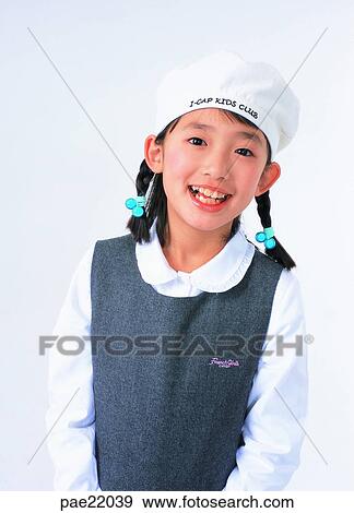 Nuki, Oriental, wearing a hat, smile, person, people View Large Photo Image Stock Photo - Nuki, Oriental, wearing a hat, smile, person, people. Fotosearch