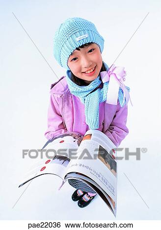 Nuki, reading, Oriental, wearing a hat, smile, person, people View Large Photo Image Stock Photograph - Nuki, reading, Oriental, wearing a hat, smile, person, people. Fotosearch