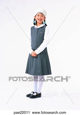 Stock Image - Nuki, upright, proper, Oriental, wearing a hat, smile, person. Fotosearch