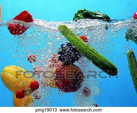 Stock Image - fruit, wash fruits, agricultural products, farm products, under water, water. Fotosearch