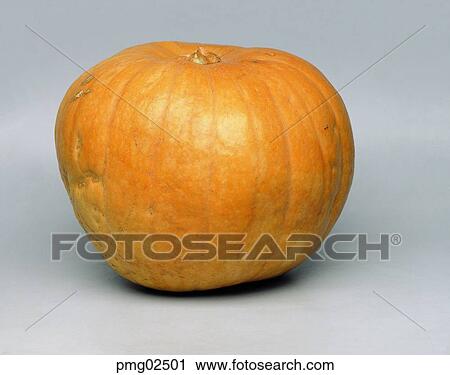Stock Image - greens, farm products, vegetables, harvest, old pumpkin, agricultural products. Fotosearch