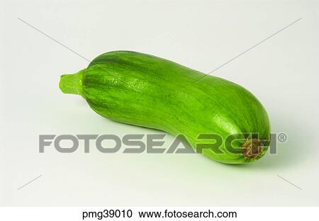Stock Image - vegetables, farm products, young pumpkin, green pumpkin, indoor, agricultural products. Fotosearch
