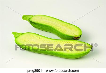 Stock Image - young pumpkin, farm products, green pumpkin, indoor, half, agricultural products. Fotosearch