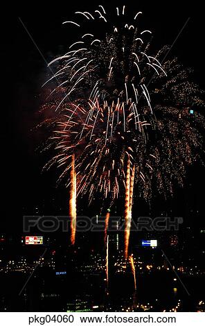 Stock Image - National Liberation Day Celebrations, neon, night, flame, blaze, spark, fireworks display. Fotosearch
