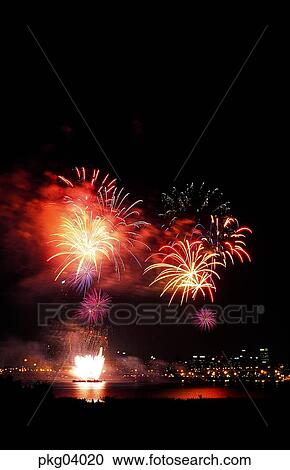 Stock Image - neon, city, night, flame, blaze, spark, fireworks display. Fotosearch