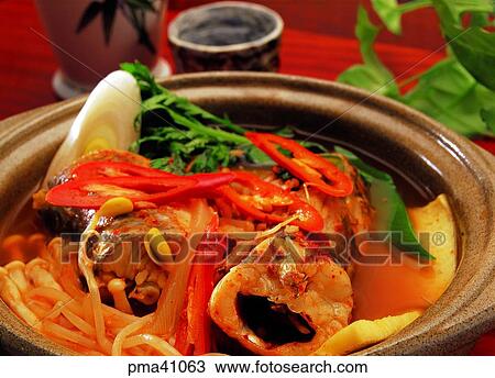 Stock Image - hot and spicy stew, hot and spicy soup, hot and spicy fish stew, fish soup, fish stew, indoor. Fotosearch