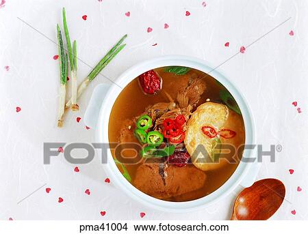 Picture - indoor, cook, cooking, food, dish, soup flavored with soy sauce. Fotosearch